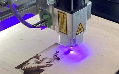 VIDEO: Laser Engraving with simCNC and CSMIO/IP vs Opt Lasers